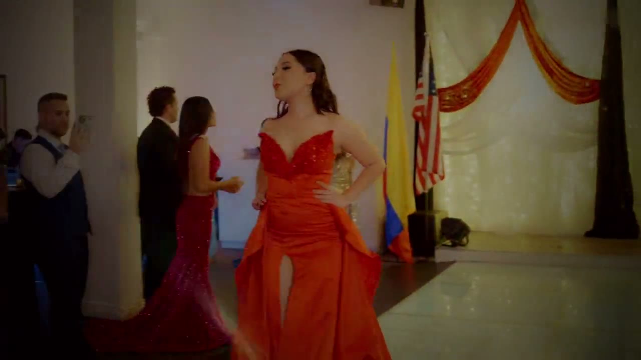 A candidate in an evening gown on the runway at Gala Night 2024